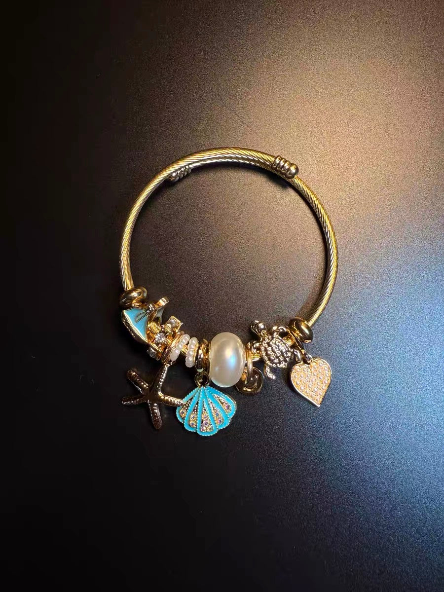 ヴィンテージ古着 Ocean Charms 青いヒトデと貝殻のブレスレット ニッチなアクセサリー