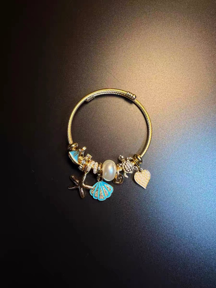 ヴィンテージ古着 Ocean Charms 青いヒトデと貝殻のブレスレット ニッチなアクセサリー