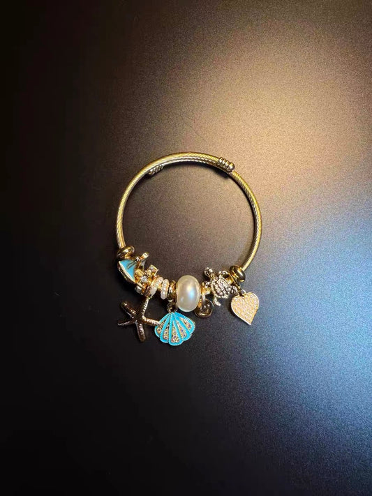 ヴィンテージ古着 Ocean Charms 青いヒトデと貝殻のブレスレット ニッチなアクセサリー