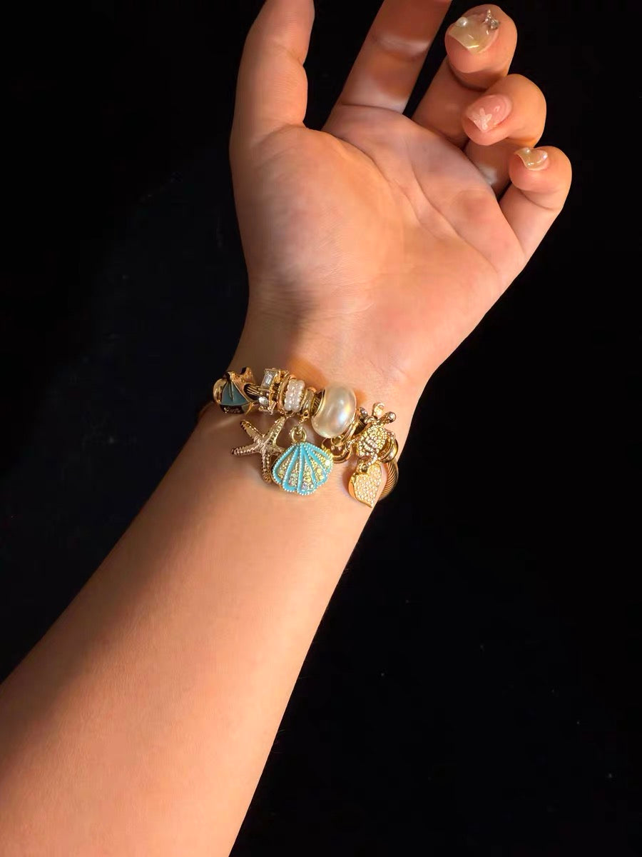 ヴィンテージ古着 Ocean Charms 青いヒトデと貝殻のブレスレット ニッチなアクセサリー