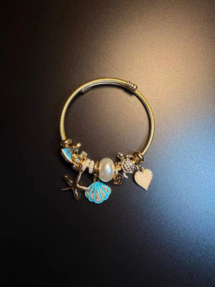 ヴィンテージ古着 Ocean Charms 青いヒトデと貝殻のブレスレット ニッチなアクセサリー
